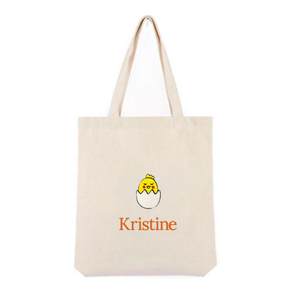 Personlig handlenett i canvas med brodert kylling i egg og tekst