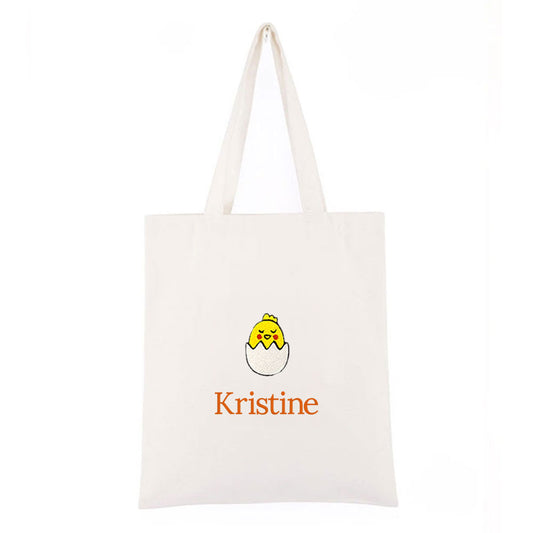 Personlig handlenett i canvas med brodert kylling i egg og tekst