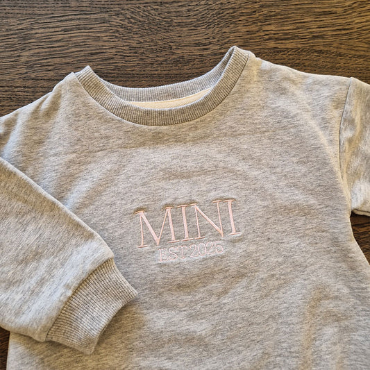 Broderi av navn - Genser (romper) til Baby