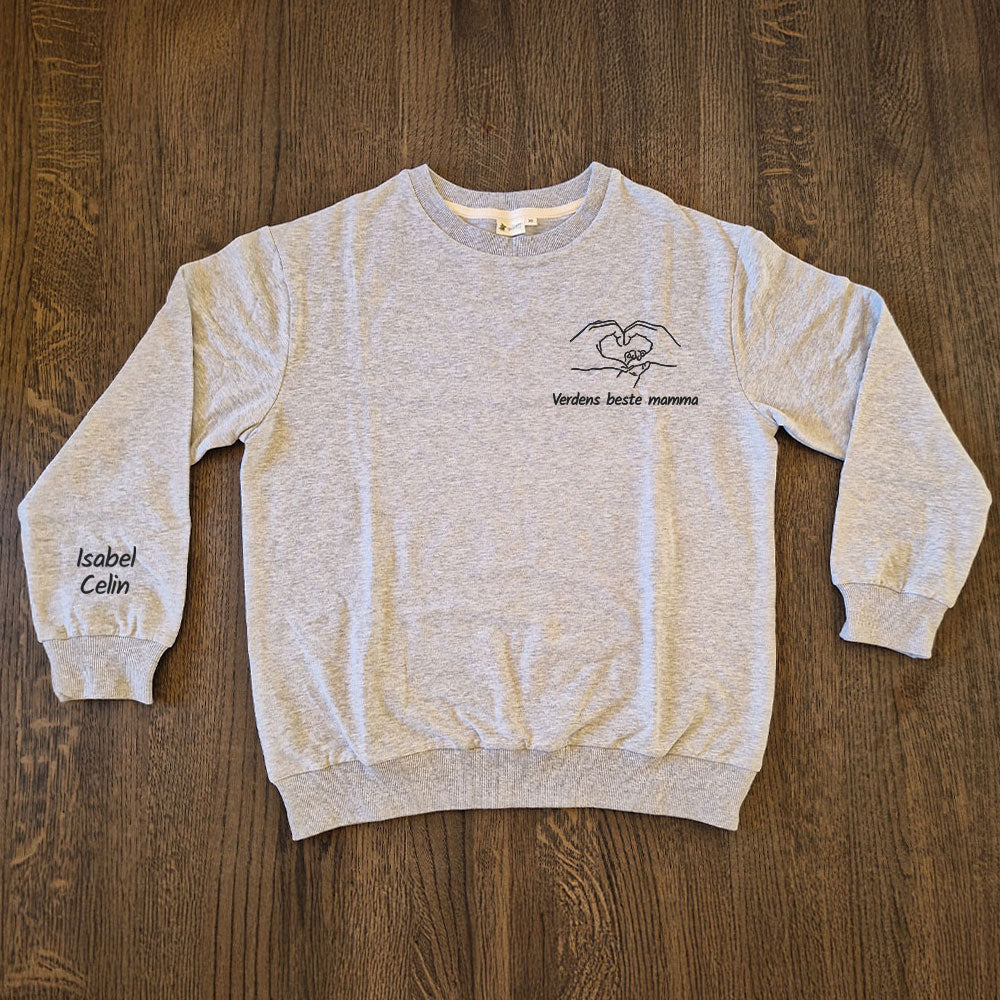 Damegenser med personlig brodert tekst og håndmotiv