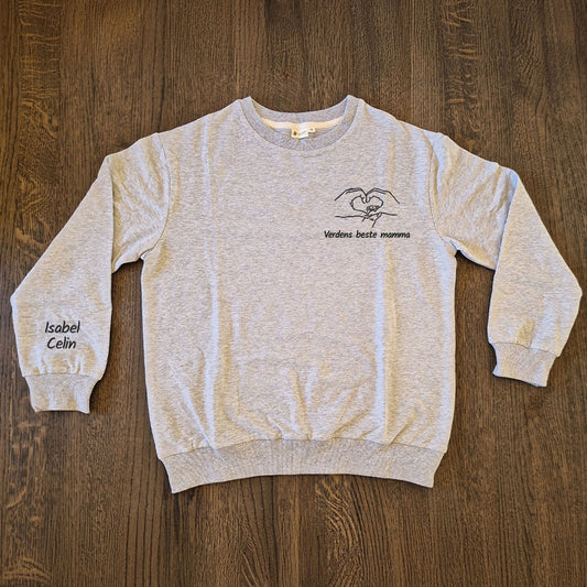 Damegenser med personlig brodert tekst og håndmotiv